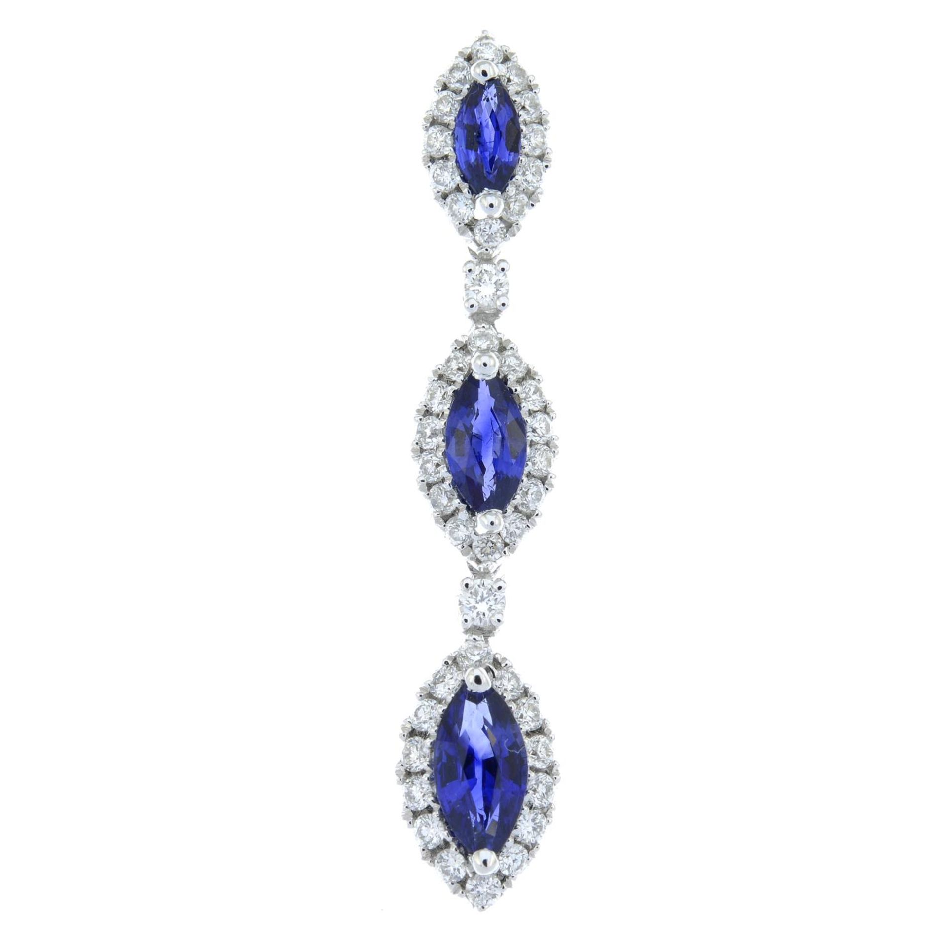 An 18ct gold sapphire and brilliant-cut diamond triple cluster pendant.Total sapphire weight