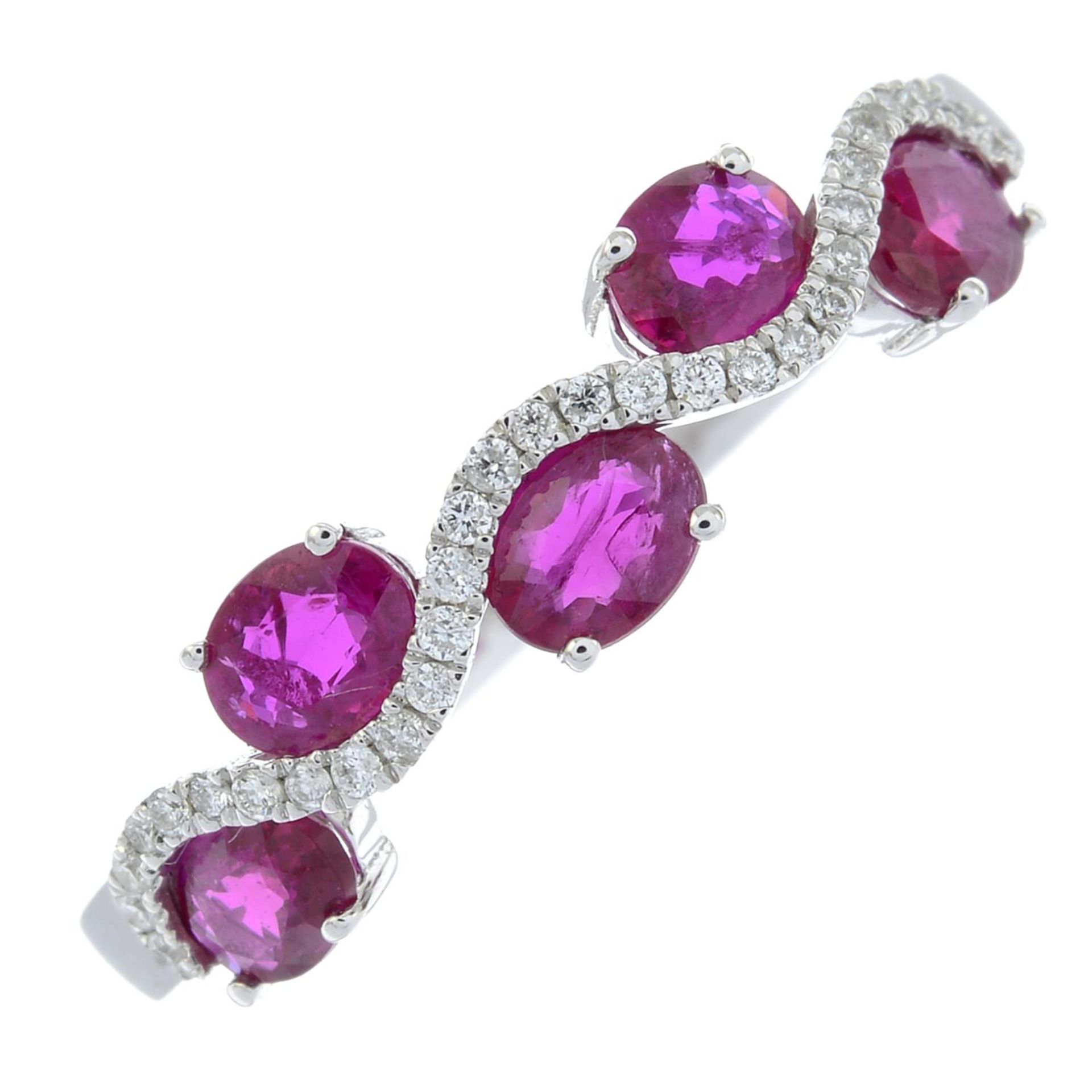 An 18ct gold ruby and brilliant-cut diamond undulating band ring.Total ruby weight