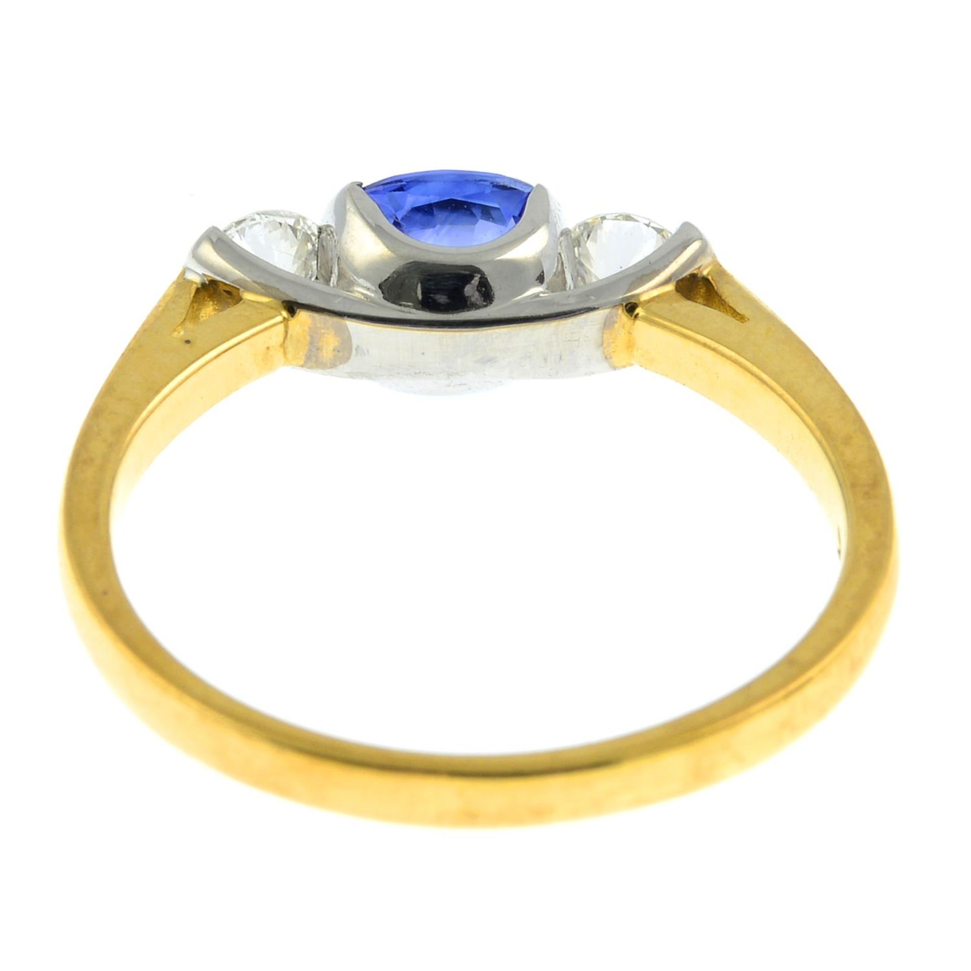 An 18ct gold sapphire and brilliant-cut diamond three-stone ring.Sapphire calculated weight 0.65ct, - Bild 2 aus 3