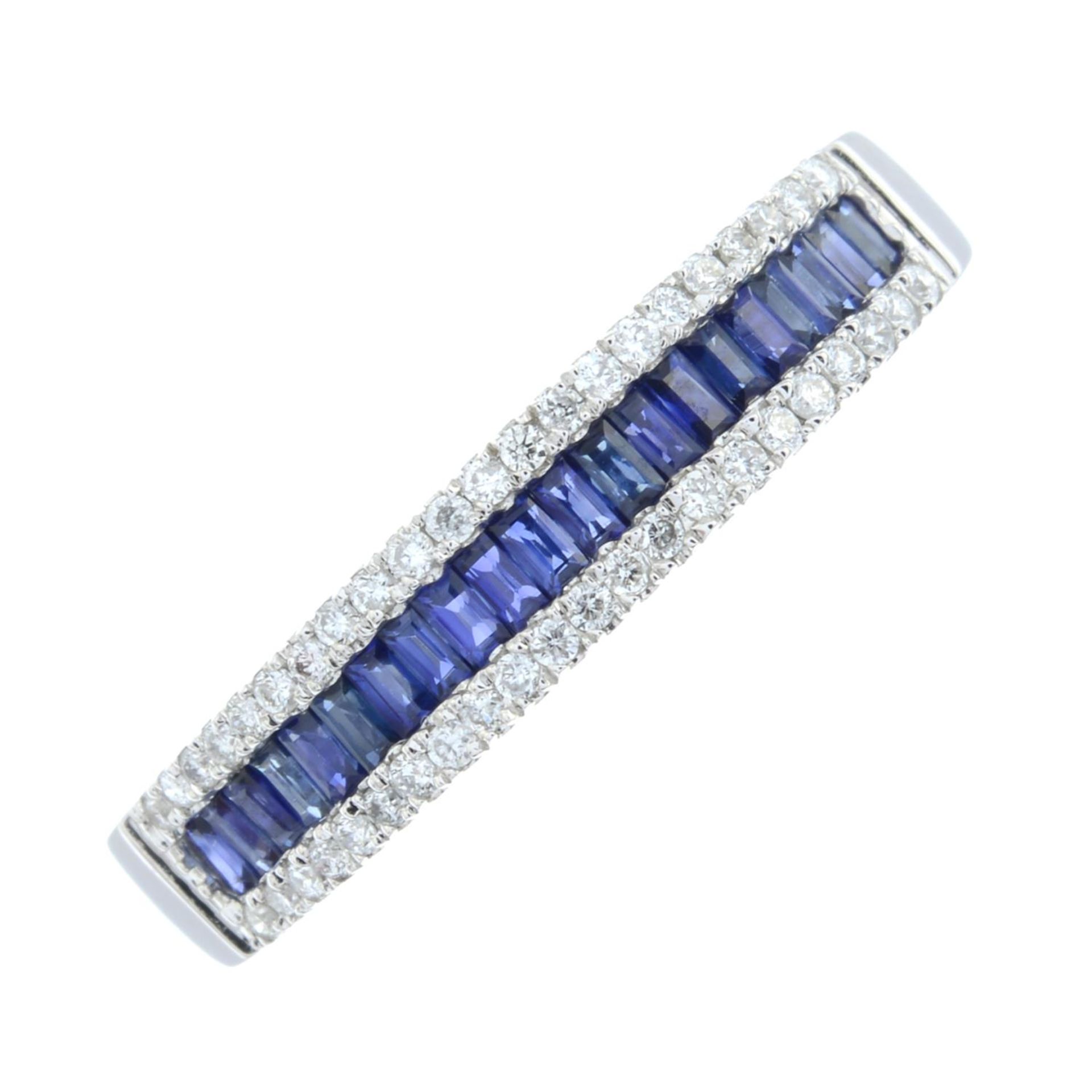 An 18ct gold brilliant-cut diamond and sapphire band ring.Total sapphire weight 0.46ct.Total
