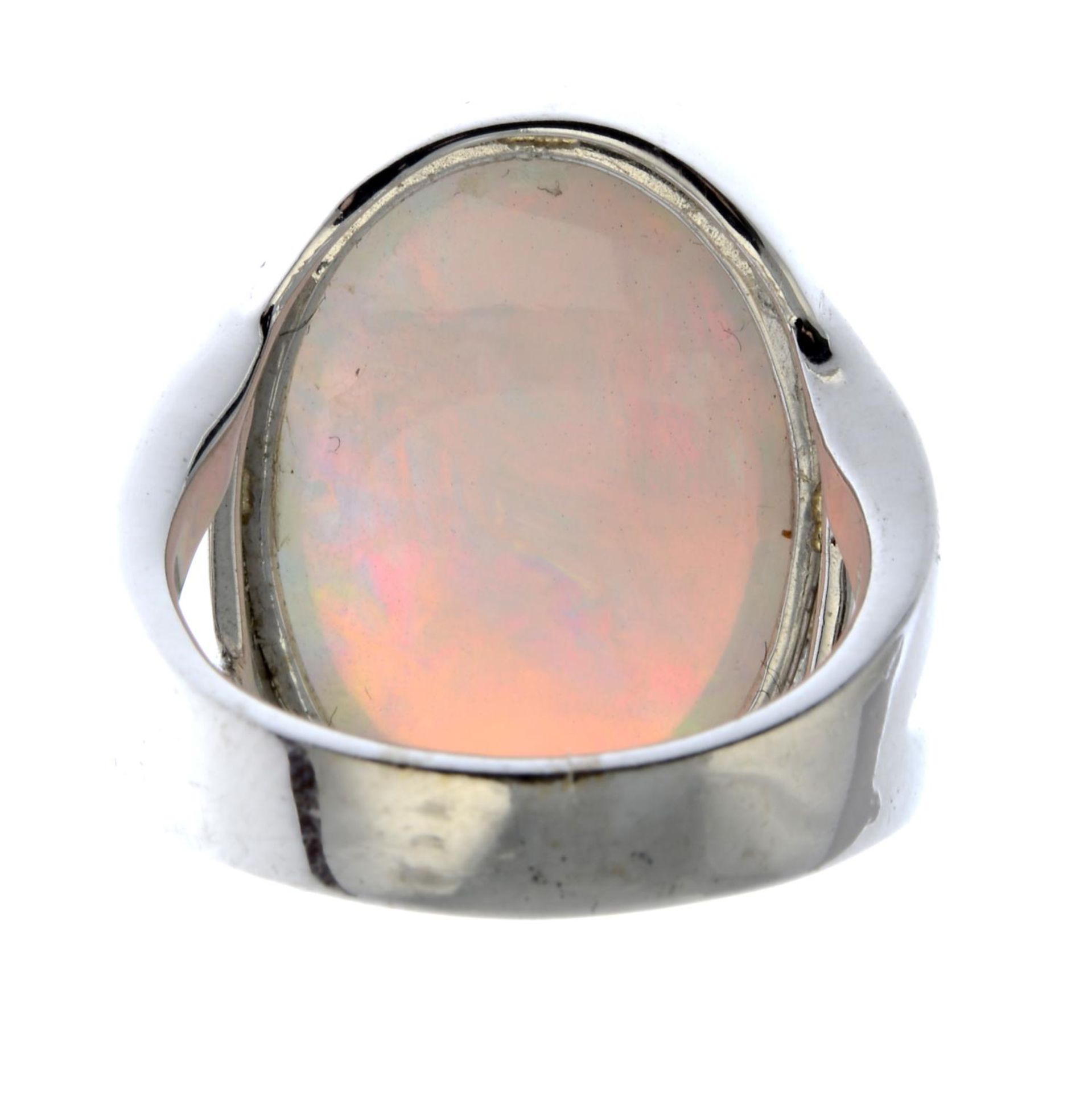 An opal cabochon single-stone ring.approximate dimensions of opal 21.2 by 15 by 11.2mms.Ring size - Image 3 of 3