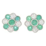 A pair of 18ct gold emerald and brilliant-cut diamond floral cluster earrings.Total emerald weight