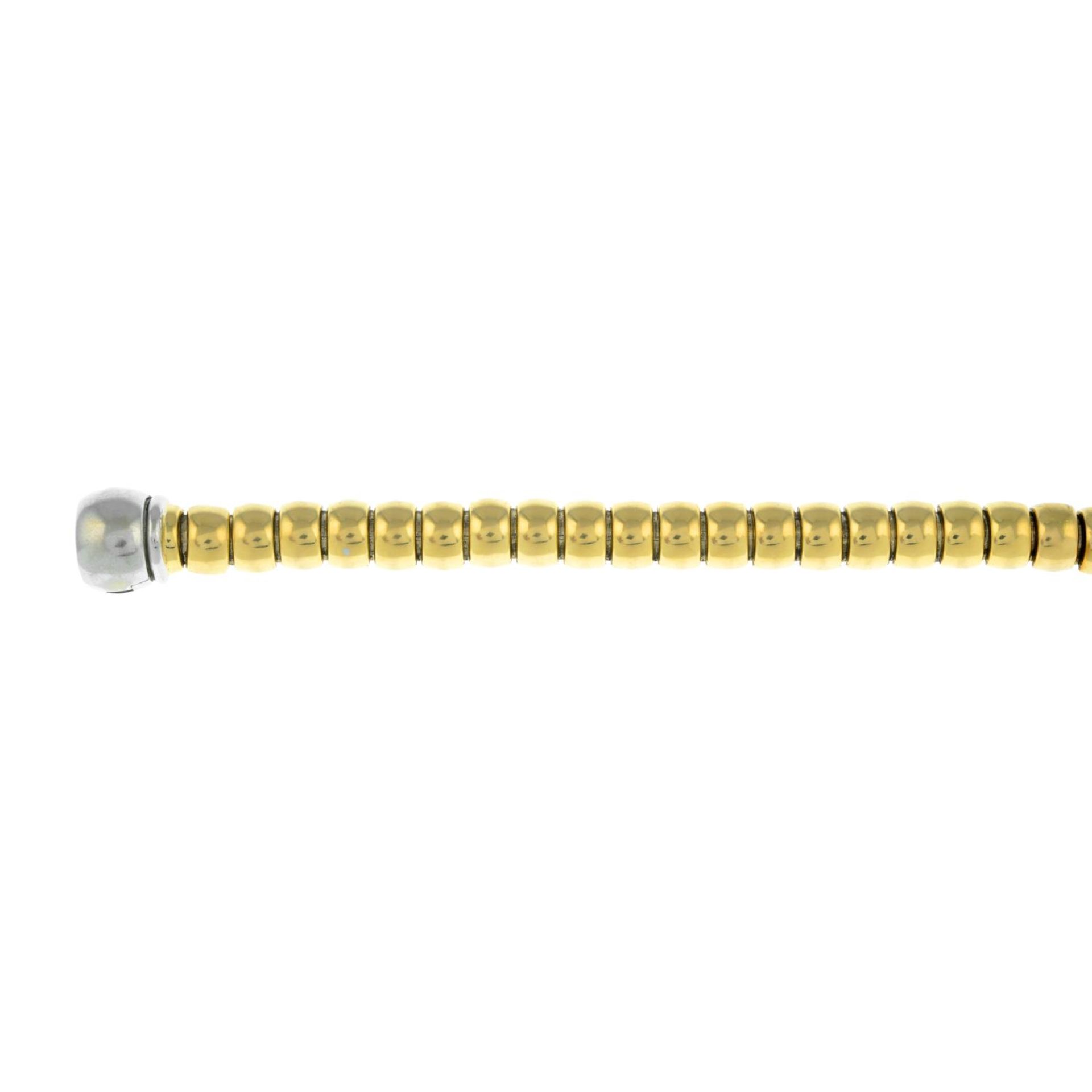 An 18ct bi-colour gold fancy-link bracelet.Hallmarks for Birmingham.