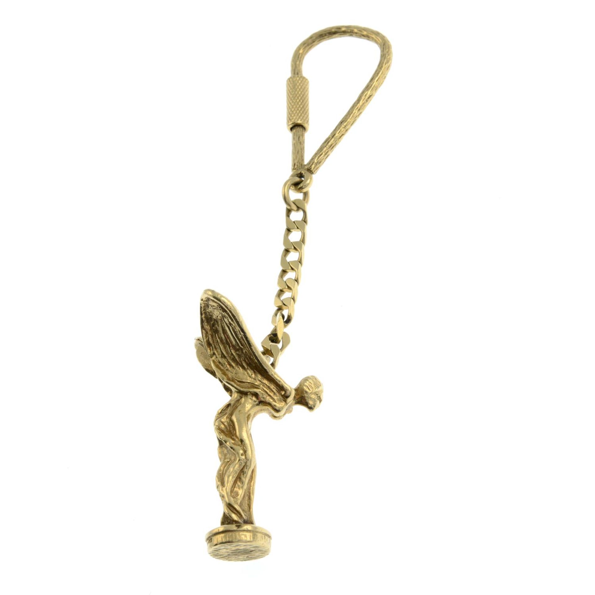 A 9ct gold key ring, suspending a Spirit of Ecstasy charm.Hallmarks for London 1989. - Image 3 of 3