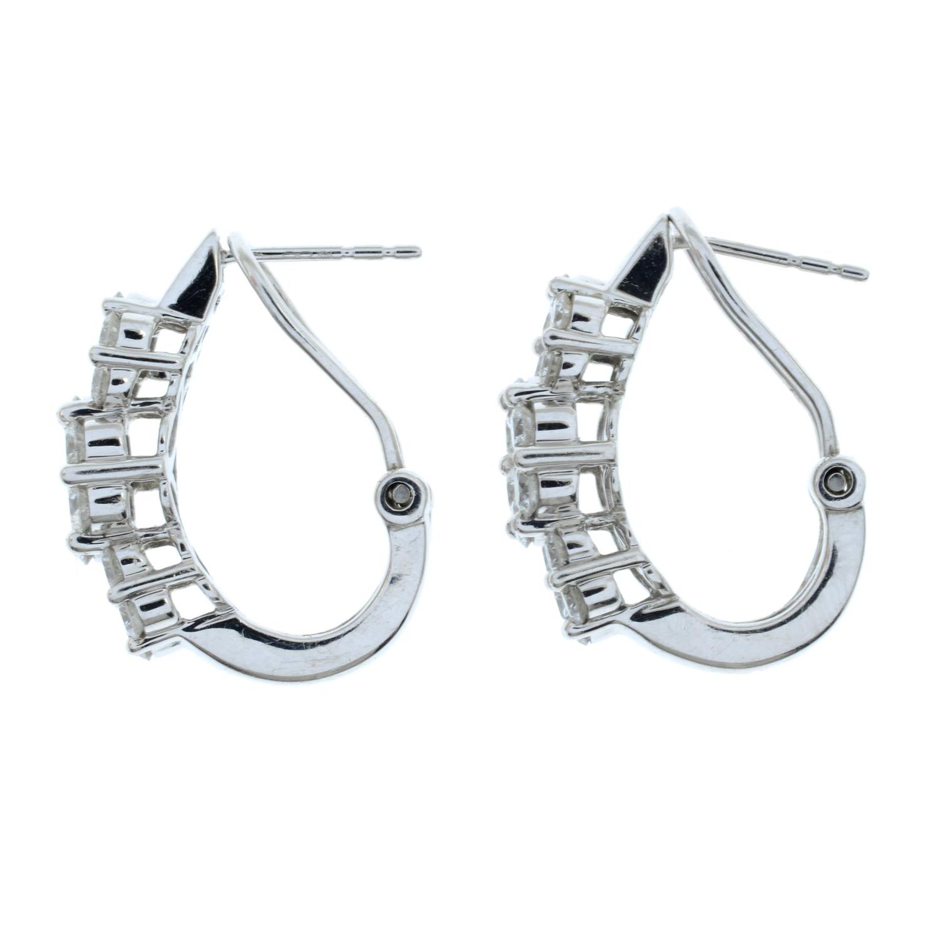 A pair of brilliant-cut diamond triple cluster earrings. - Image 3 of 3