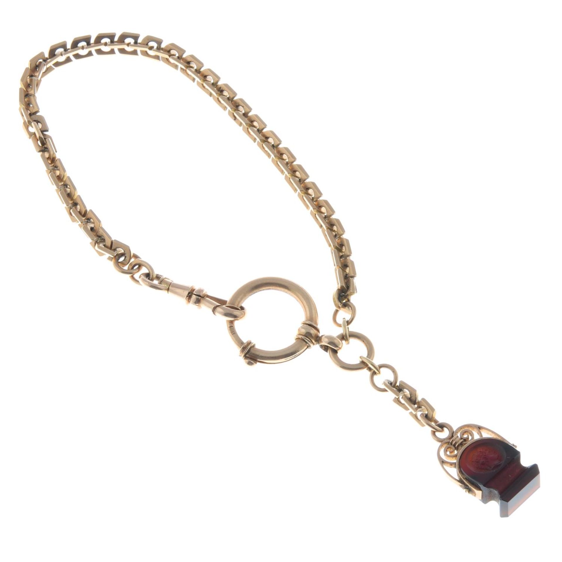 A fancy-link chain bracelet, suspending a carnelian fob.Stamped 585.Length 20cms. - Image 2 of 2