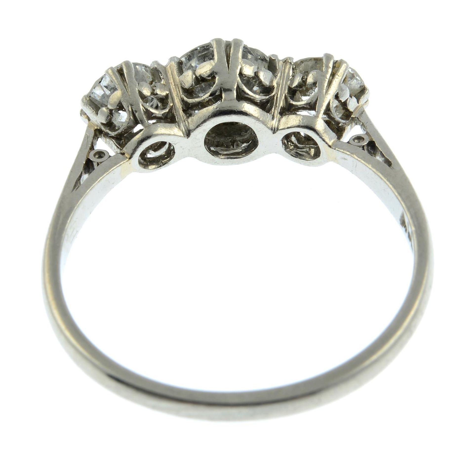 An old- cut diamond three-stone ring.Estimated total diamond weight 1.30cts, - Image 2 of 3