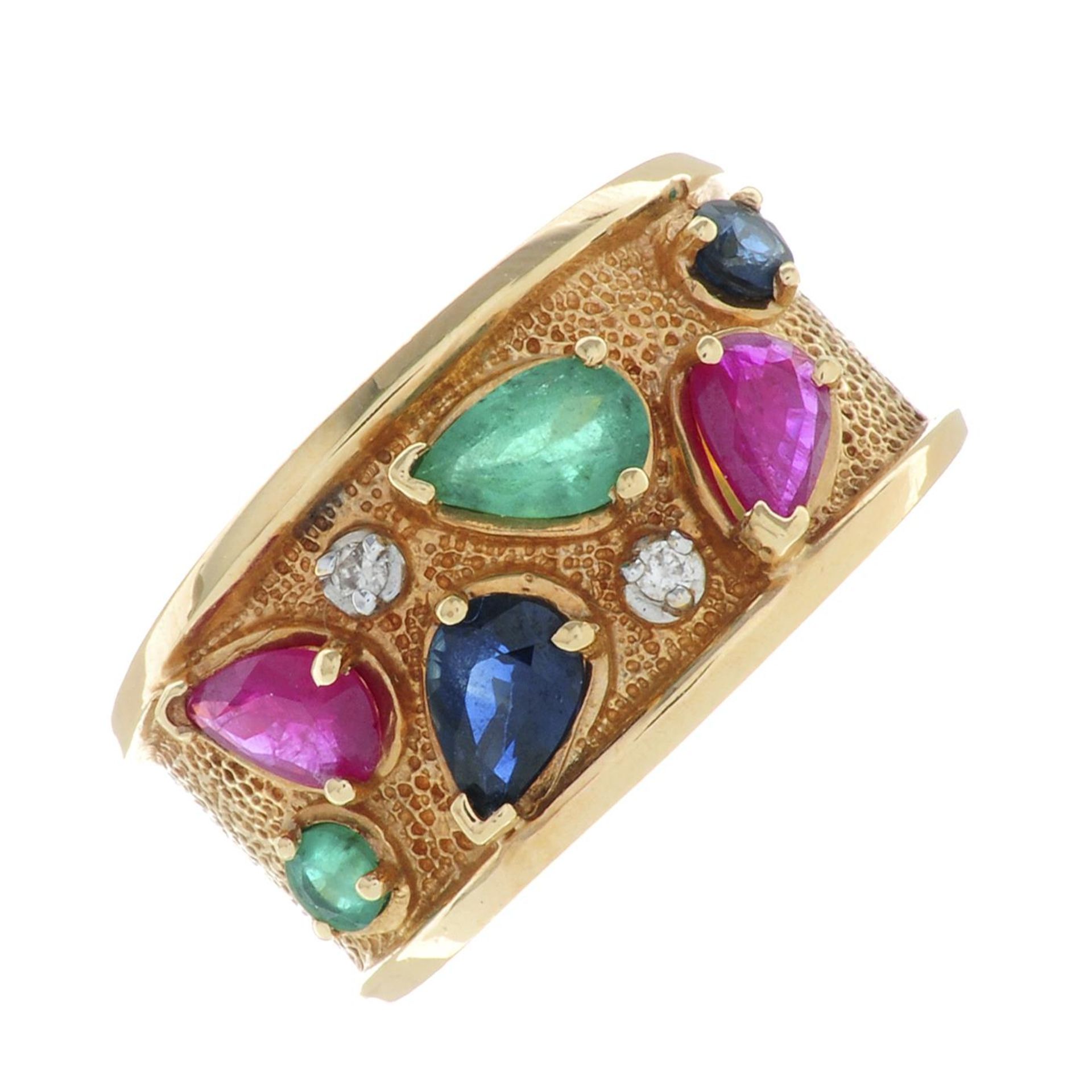 A ruby, sapphire, emerald and brilliant-cut diamond dress ring.Stamped 14K.Ring size R.
