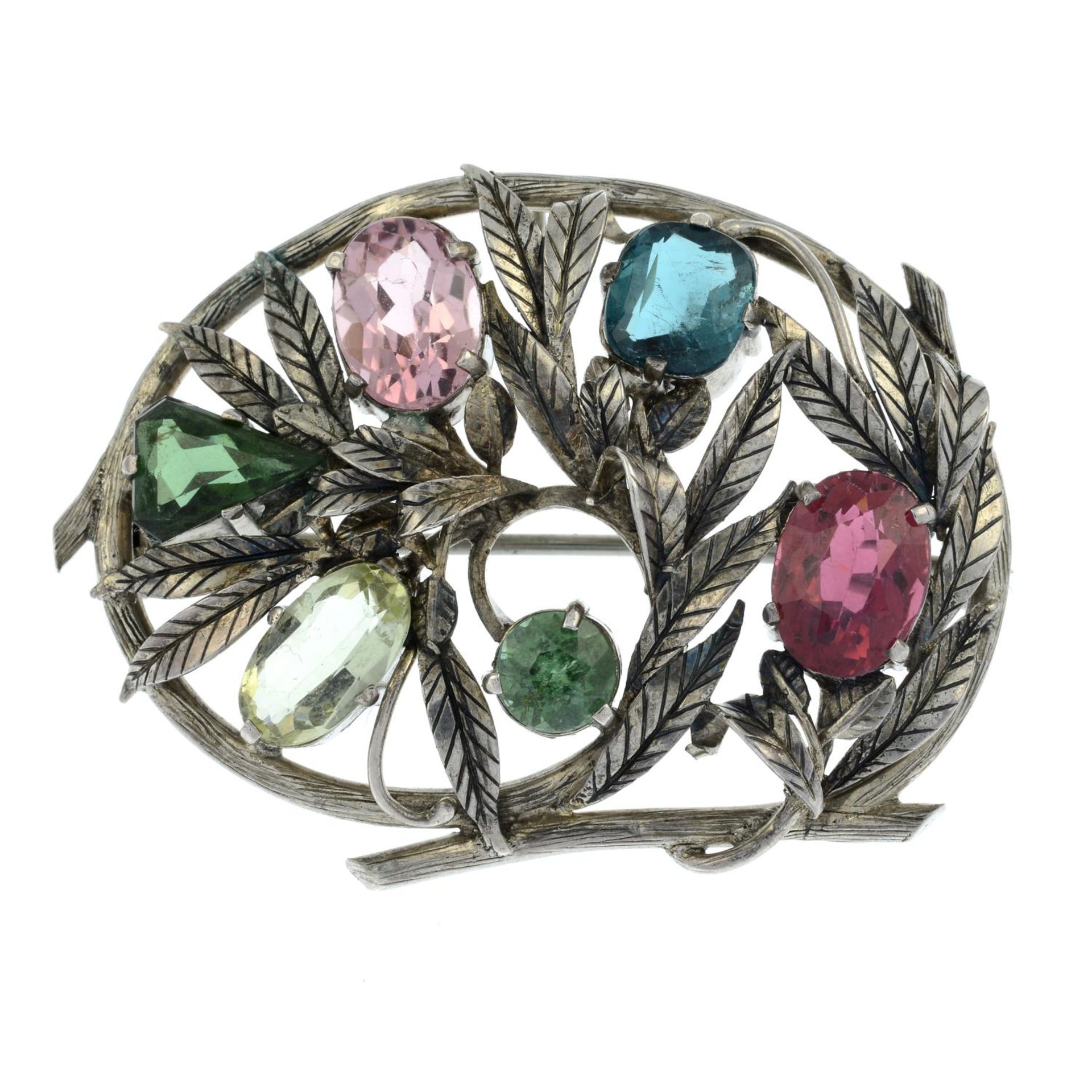 An Arts and Crafts silver vari-hue tourmaline brooch, Attributed to Edith Linnell.Length 3.8cms.