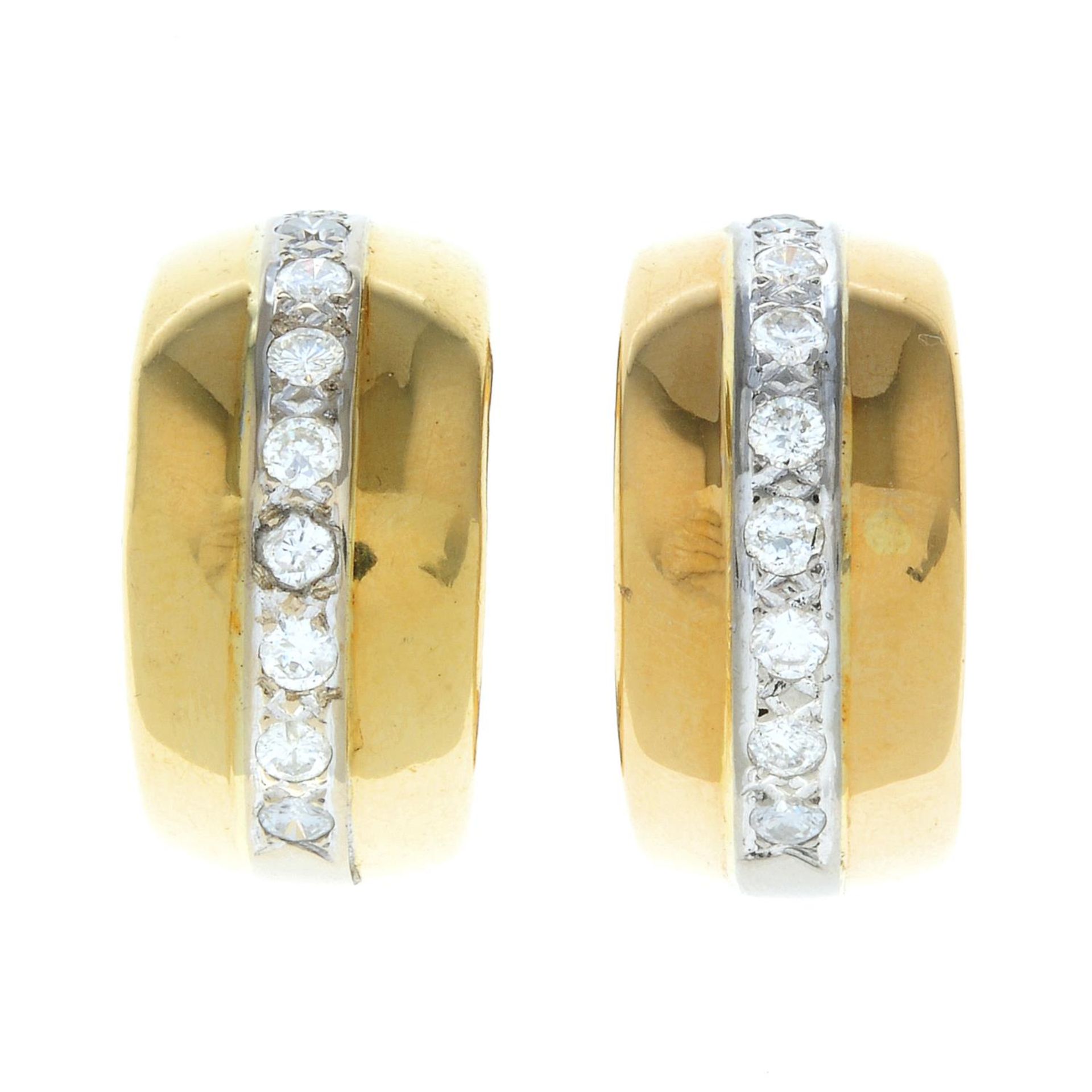 A pair of brilliant-cut diamond hoop earrings.Estimated total diamond weight 1.60cts,
