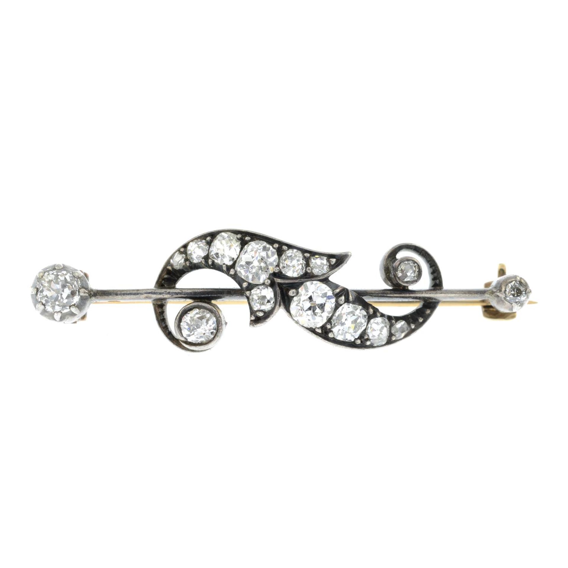 An Art Nouveau 9ct gold and silver old-cut diamond bar brooch.Estimated total diamond weight 1ct,