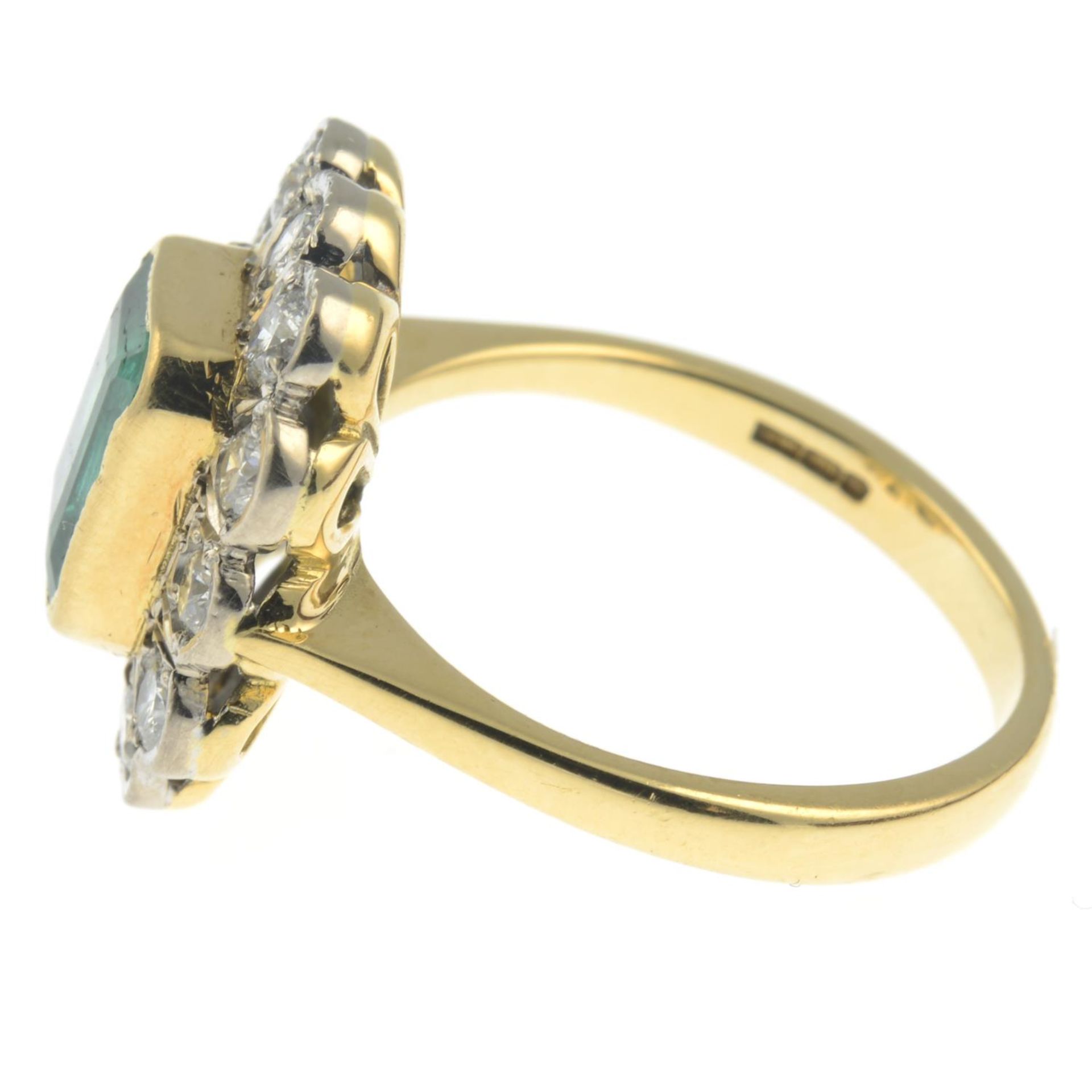 An 18ct gold emerald and diamond cluster ring. - Image 2 of 5