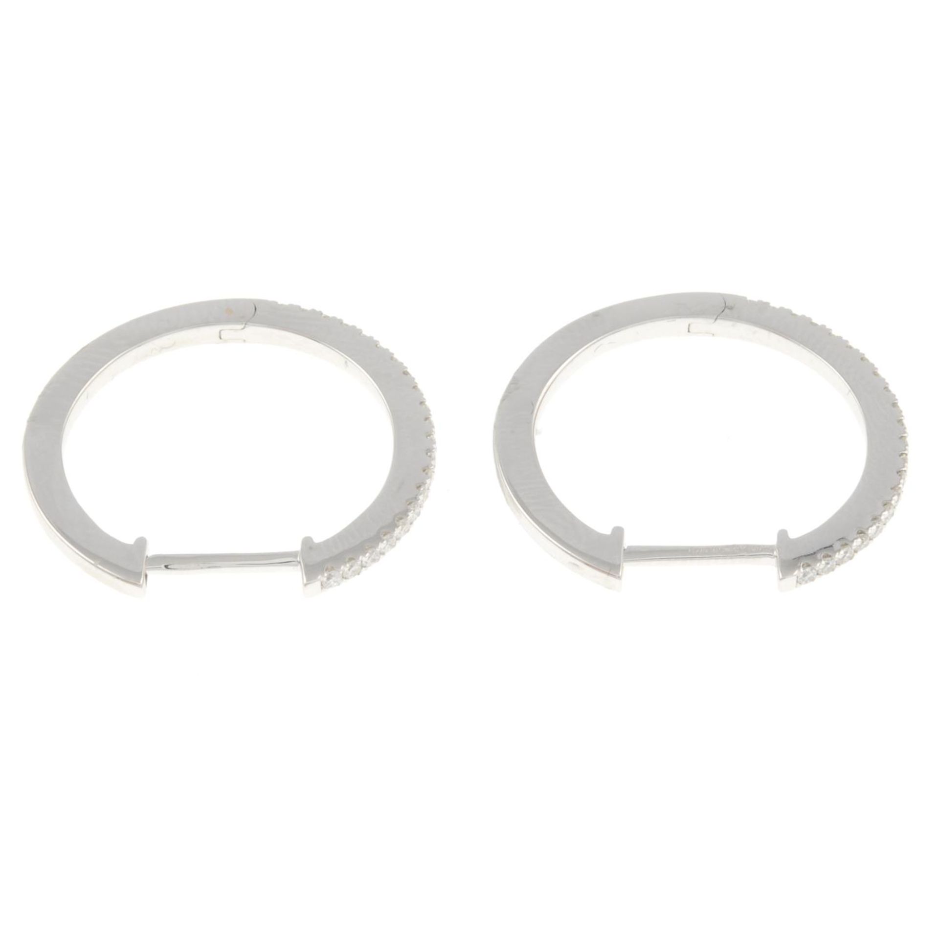 A pair of 18ct gold brilliant-cut diamond hoop earrings, - Image 4 of 4