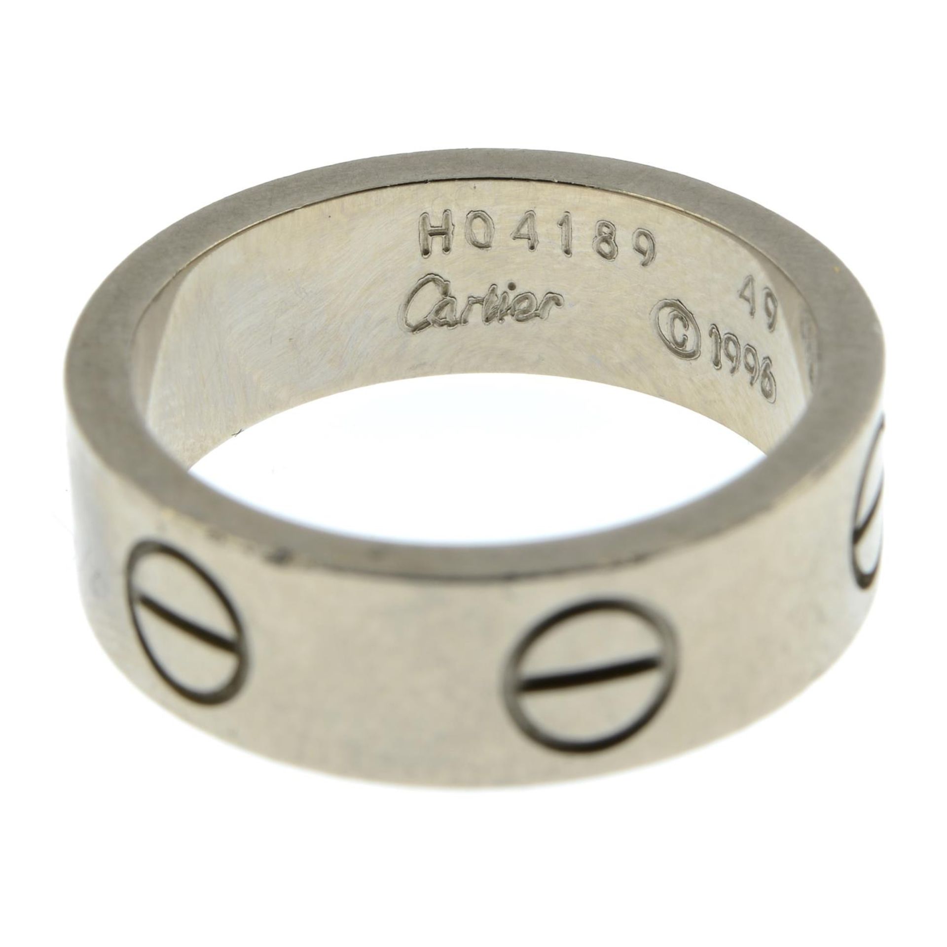 A 'Love' ring, by Cartier.Signed Cartier, H04189.Stamped 750, Italian marks. - Bild 2 aus 3