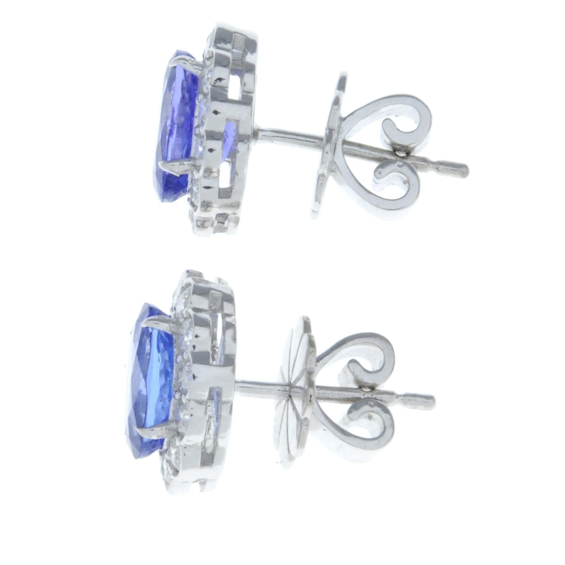 A pair of tanzanite and brilliant-cut diamond cluster earrings.Total tanzanite weight 1.72cts, - Image 2 of 2