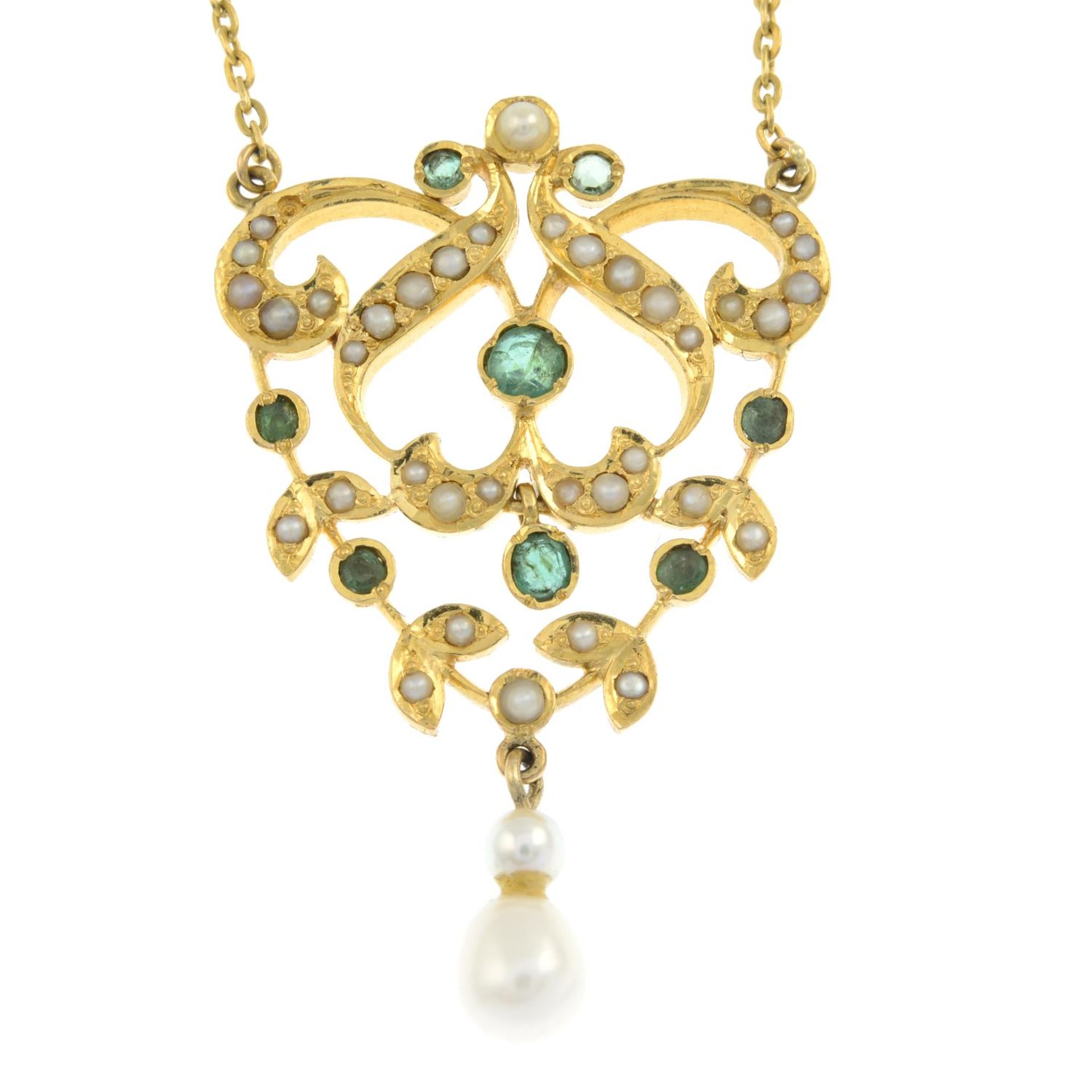 An emerald and split pearl openwork pendant,