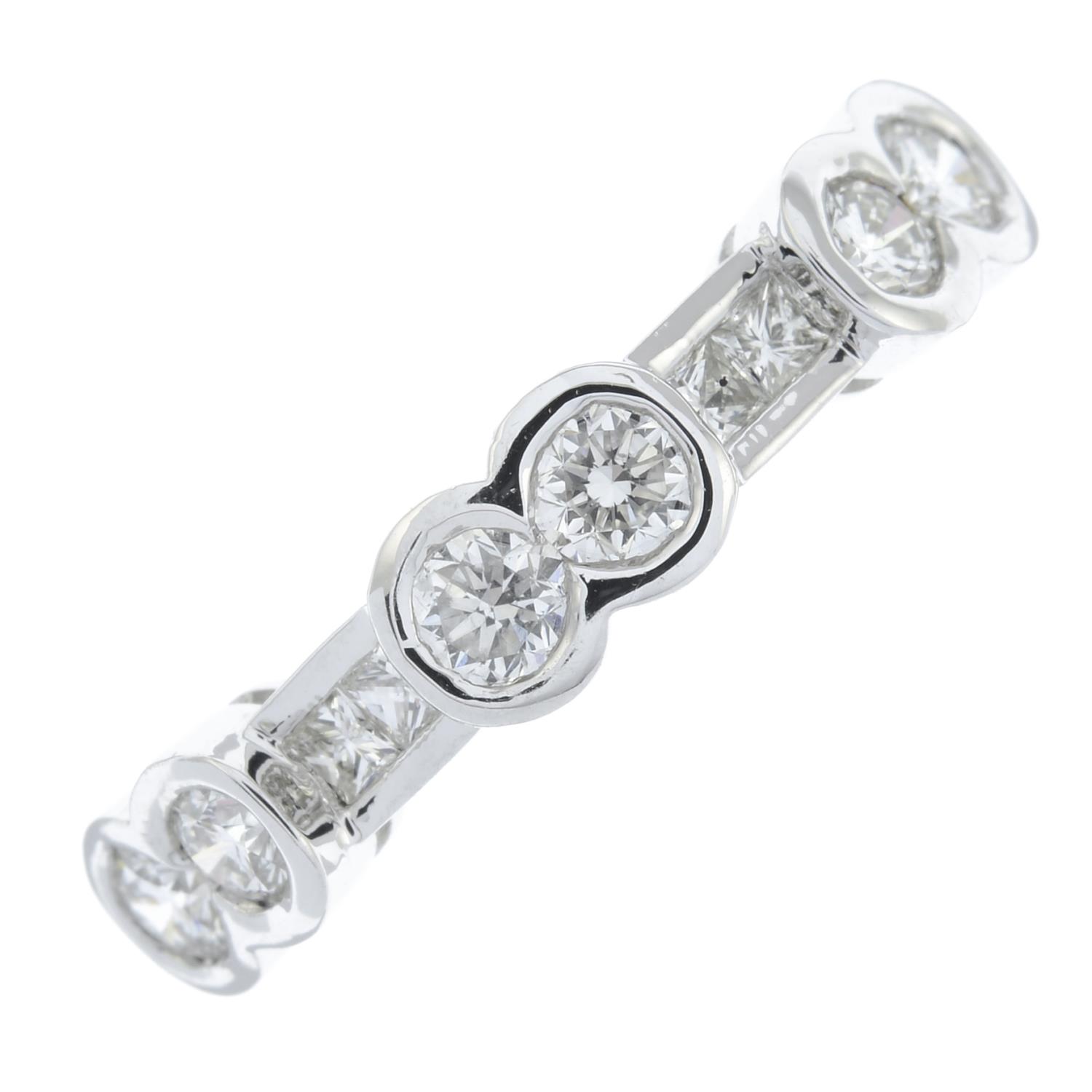 A brilliant-cut and square-shape diamond half eternity ring.Total diamond weight 0.76ct.Stamped