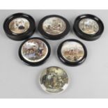 A selection of eight 19th century Prattware pottery pot lids,