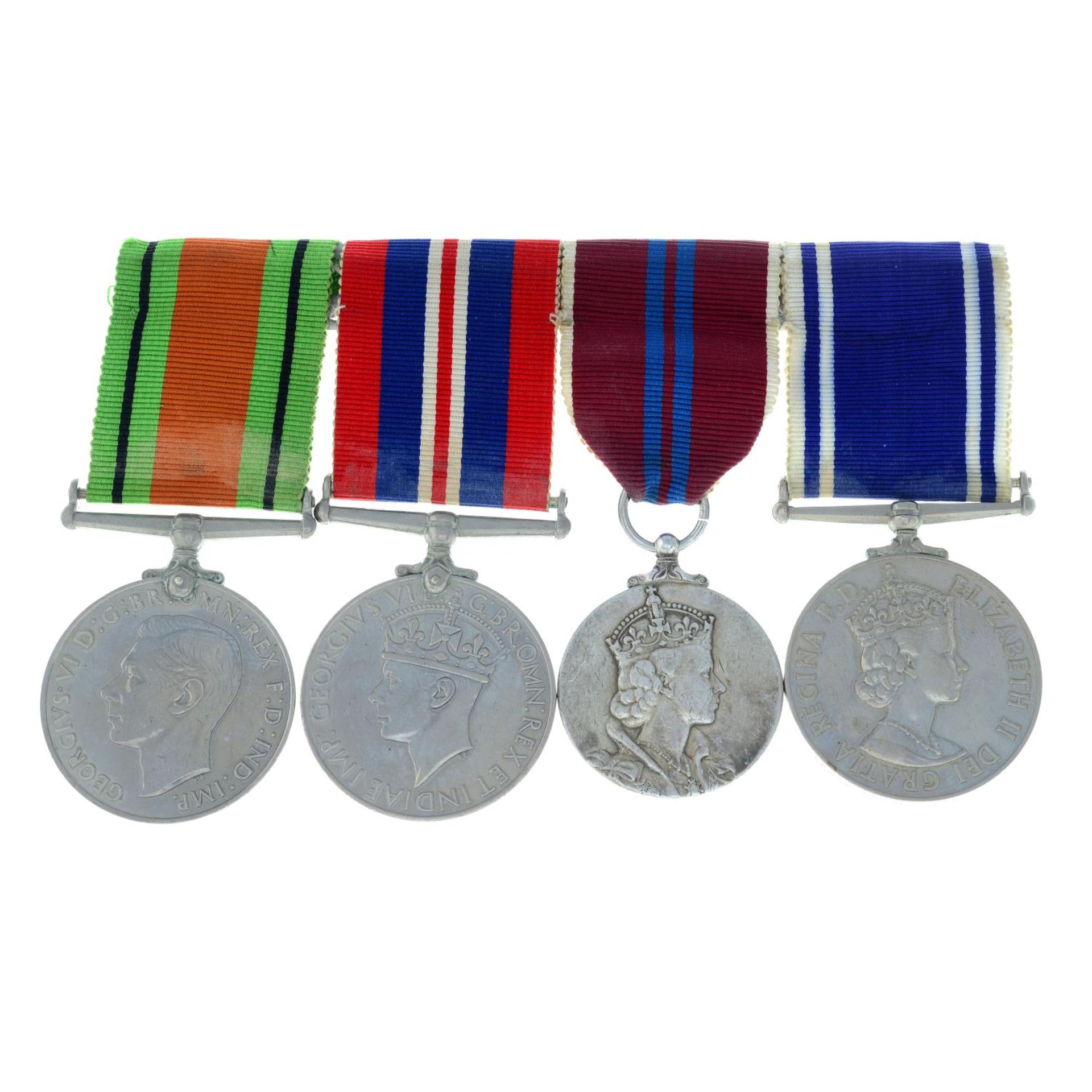 A group of four medals,