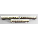 A large mixed selection of assorted 00 gauge model railway passenger coaches,