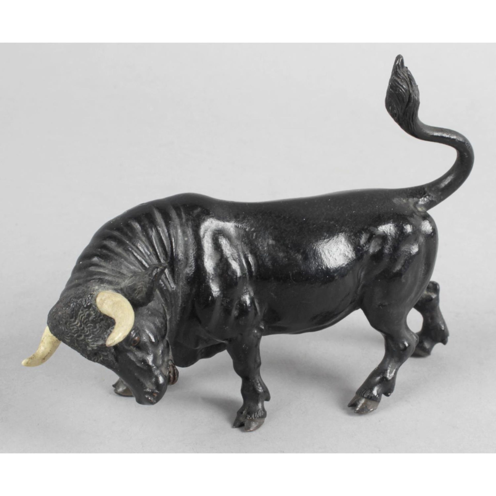 Geschultz, an Austrian cold painted bronze modelled as a bull.,