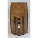An early 19th century mahogany knife box,