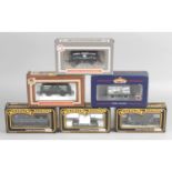 A large selection of mixed 00 gauge model railway rolling stock items,