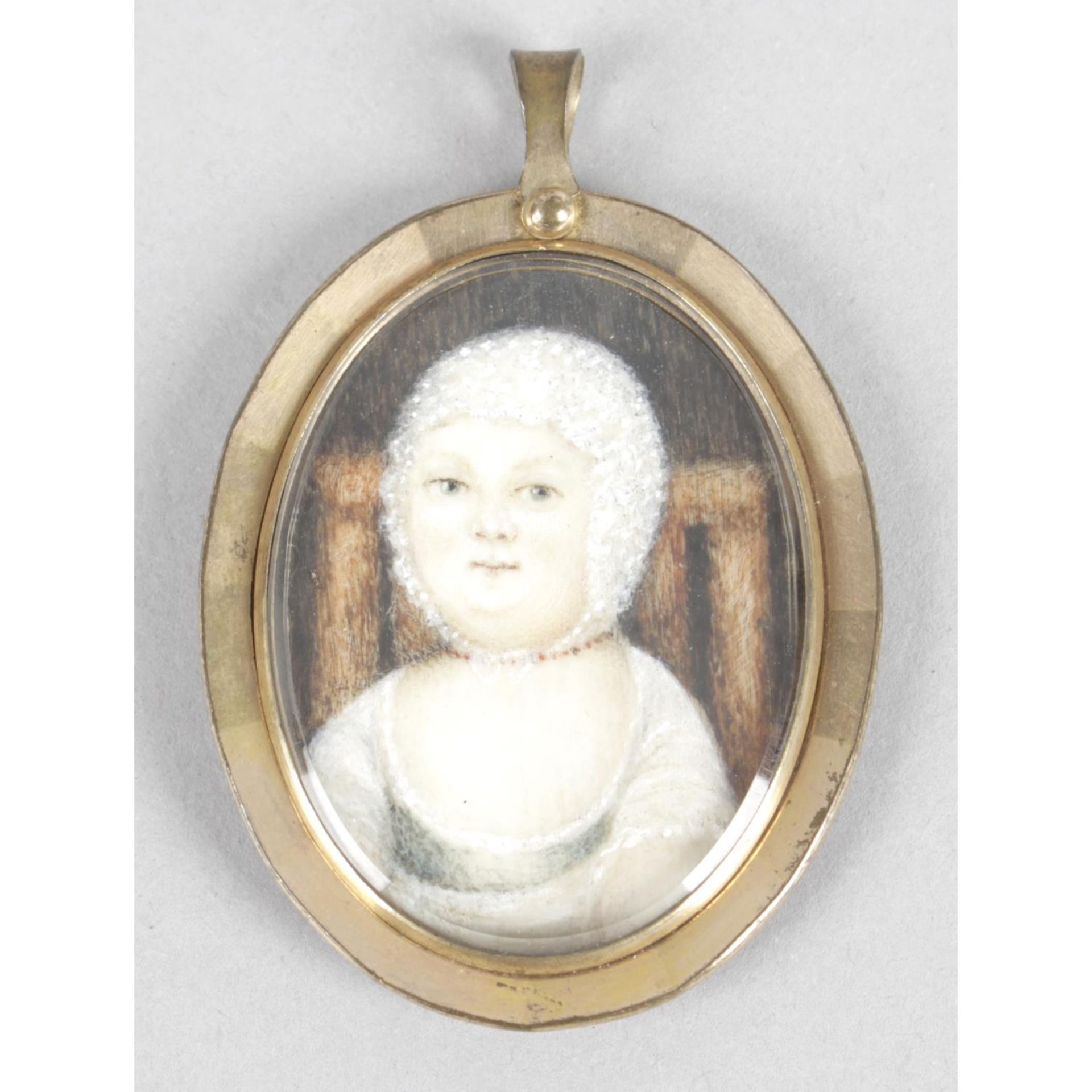 A nineteenth century oval head and shoulder painted portrait miniature,