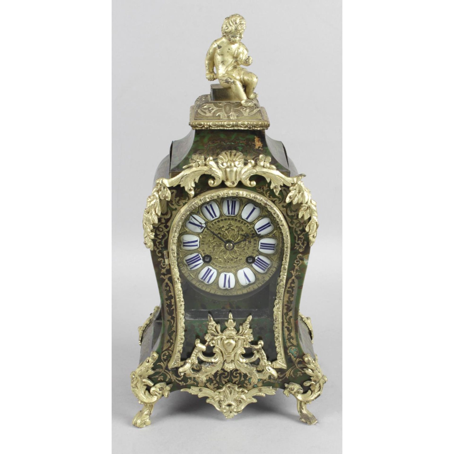 A late 19th century French green boulle work cased mantel clock,