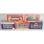 A selection of assorted 00 gauge model railway rolling stock,