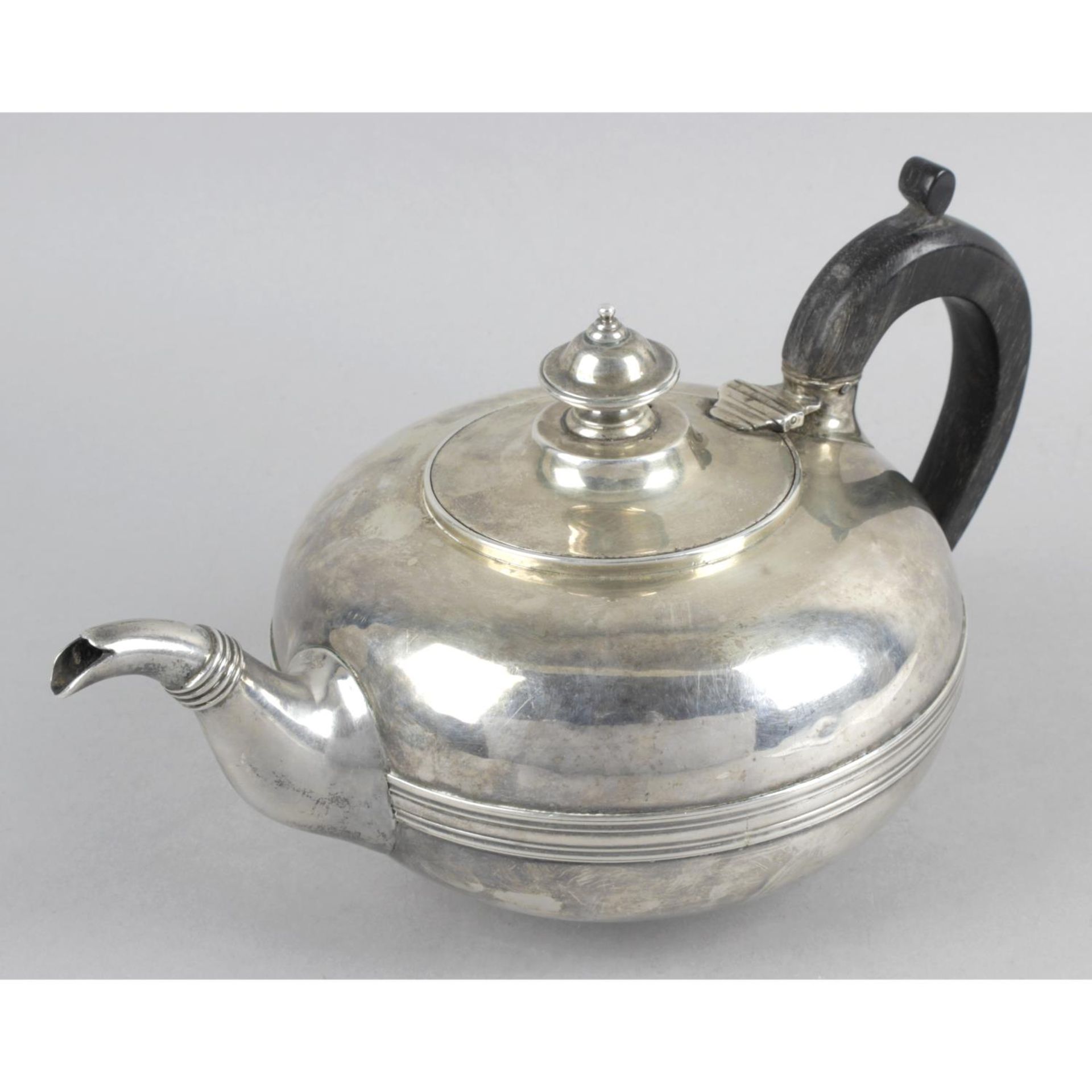 A George IV silver teapot,