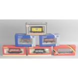 A large selection of mixed 00 gauge model railway rolling stock items,