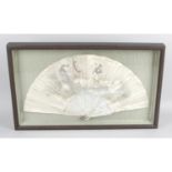 An early twentieth century ladies handheld folding fan, with shaped Mother of pearl montures.