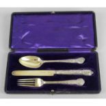 A cased Victorian silver gilt christening set,