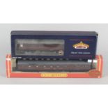 A selection of assorted boxed 00 gauge model railway rolling stock,