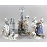 A set of four Lladro seasons figurines,