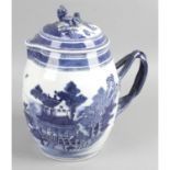 A late 18th century blue and white cider jug,