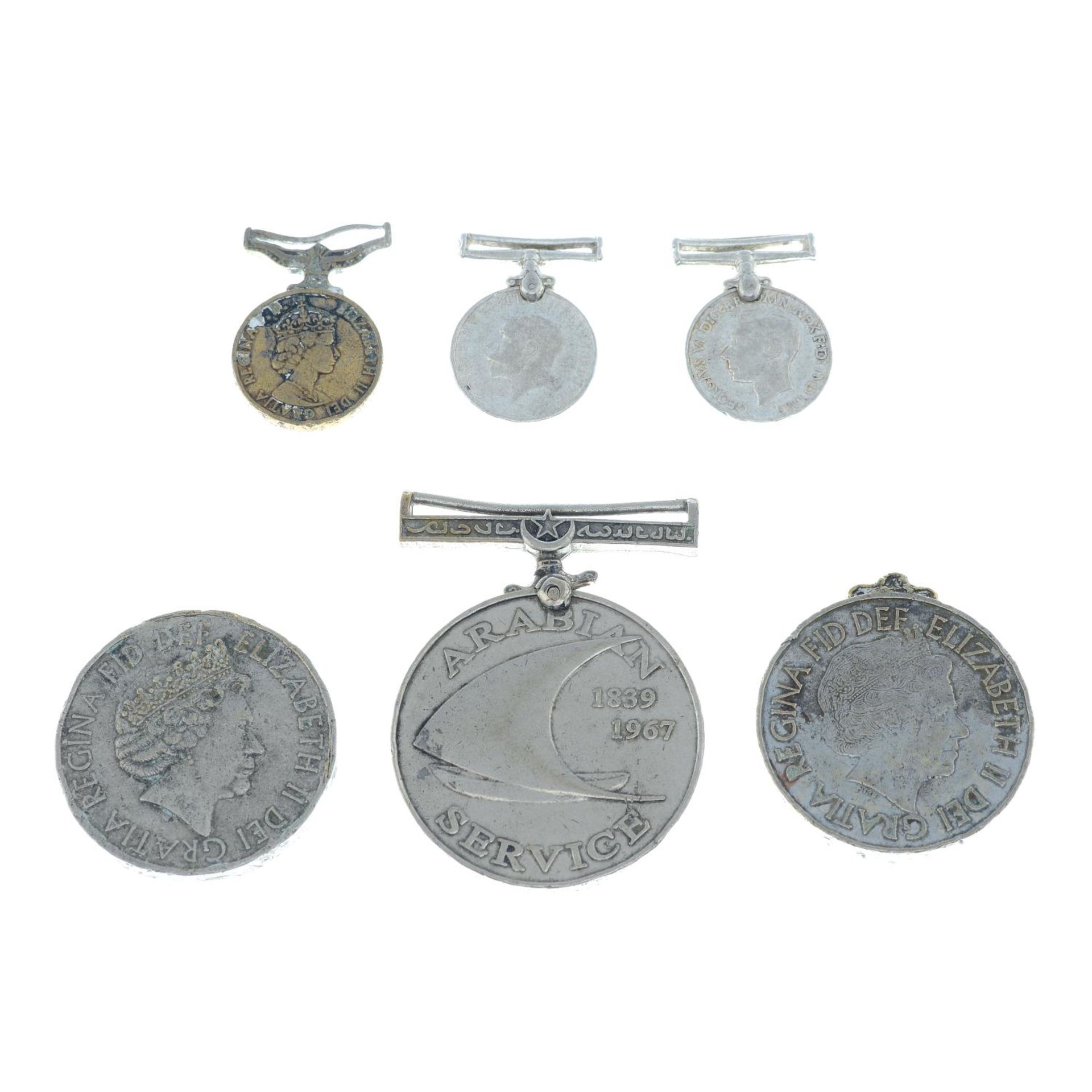 A small mixed selection of assorted medals and coins,