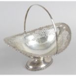 An Edwardian silver pedestal fruit basket,