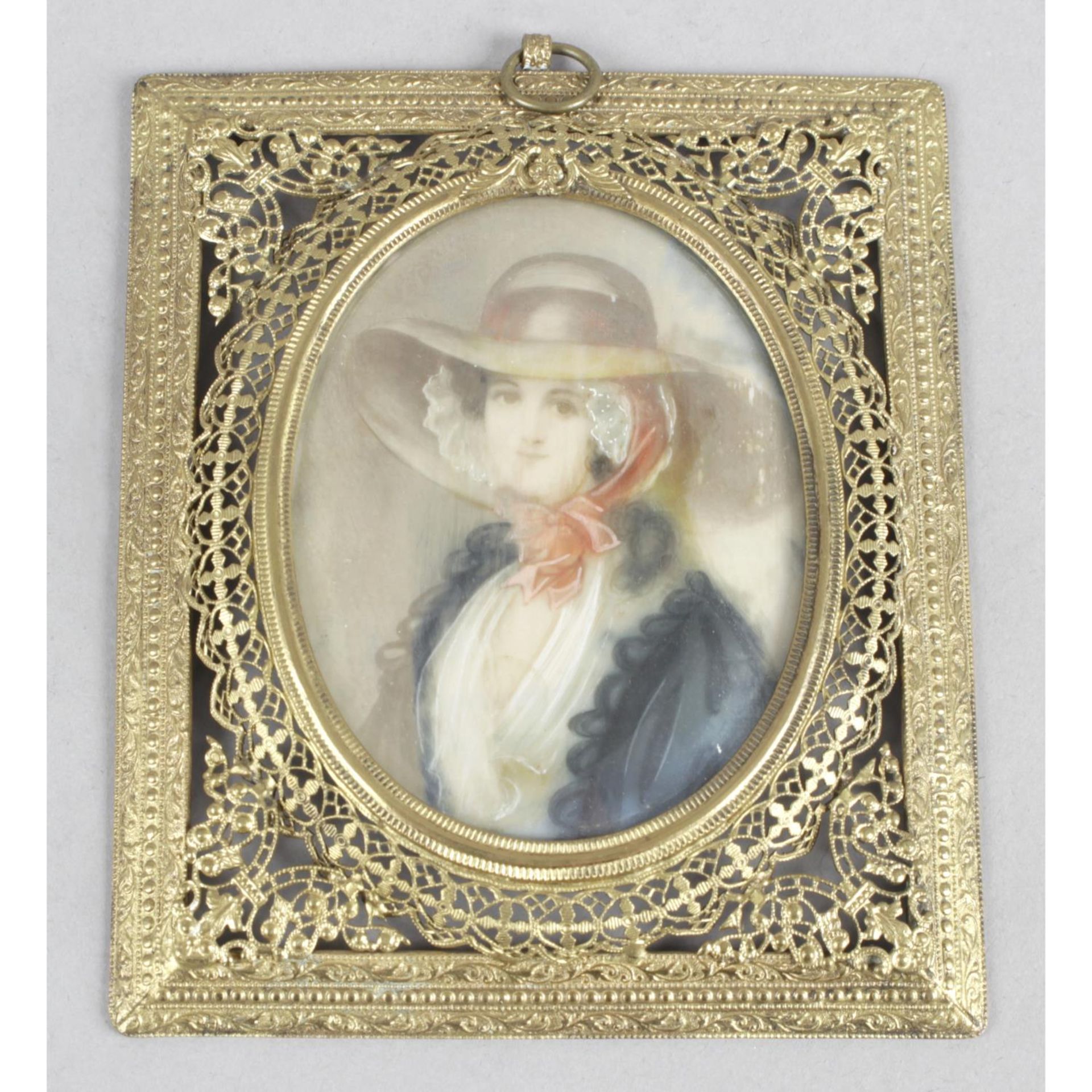 An early 20th century oval miniature head-and-shoulder portrait,