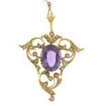 An early 20th century 15ct gold amethyst and split pearl brooch.May be worn as a pendant.