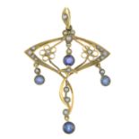 An Art Nouveau 15ct gold sapphire and split pearl pendant.Stamped 15ct.Length 4.5cms.