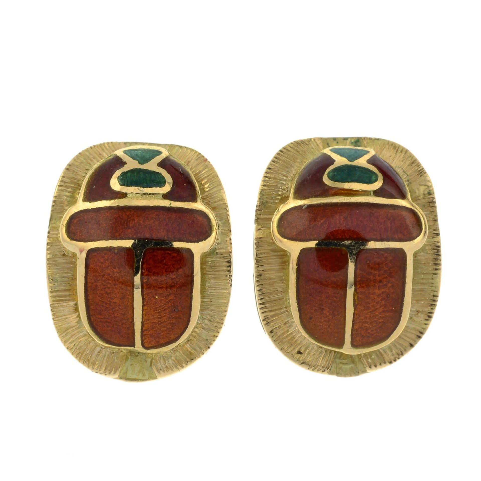 A pair of orange and green enamel scarab earrings.Length 1.3cms.