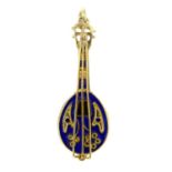 A blue enamel mandolin pendant.Stamped 585.Length 3.7cms.