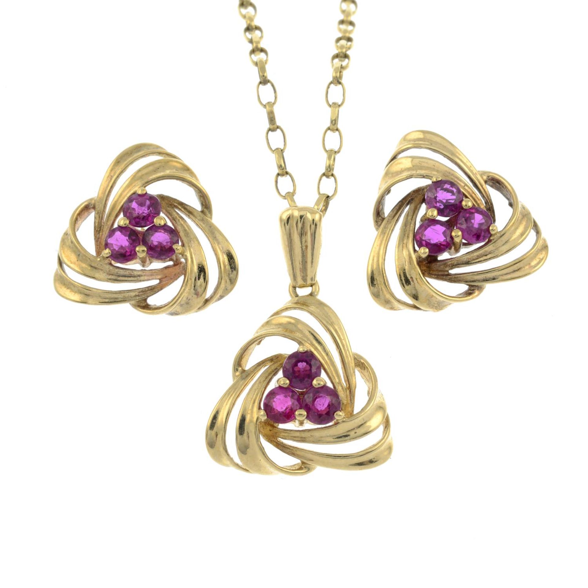 9ct gold ruby floral pendant,