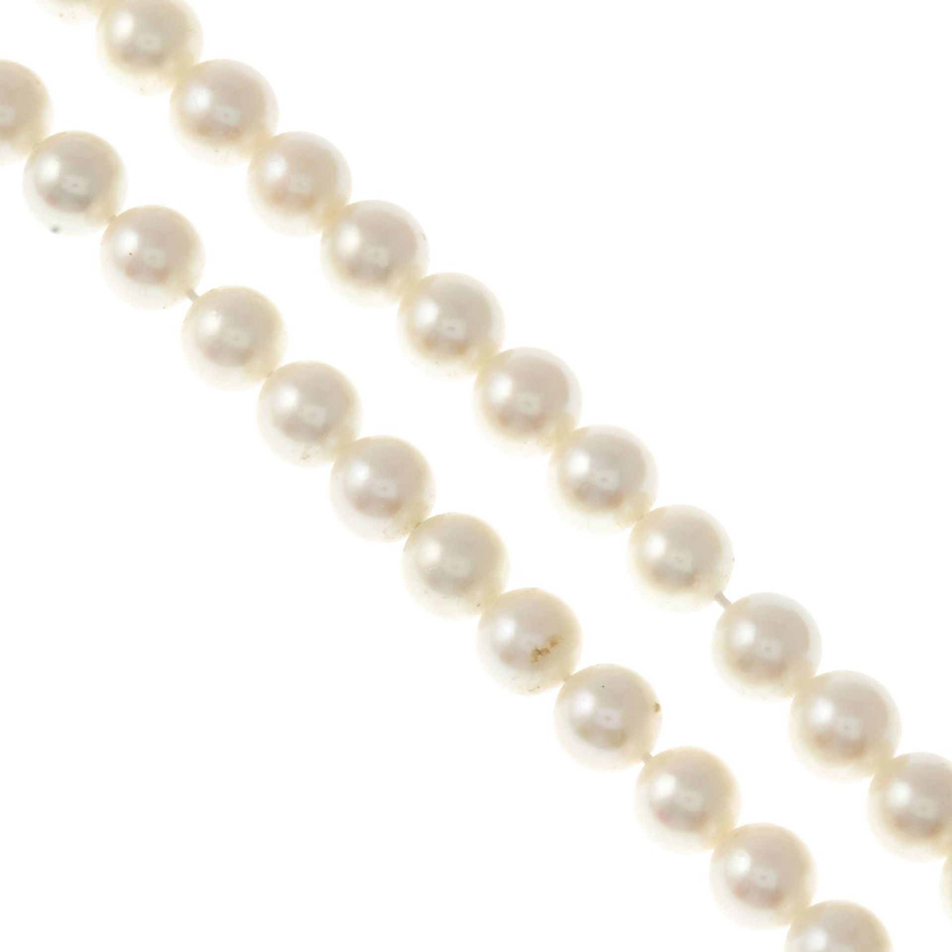 A cultured pearl two-row necklace.Cultured pearls measuring 7.4 to 7.2mms.