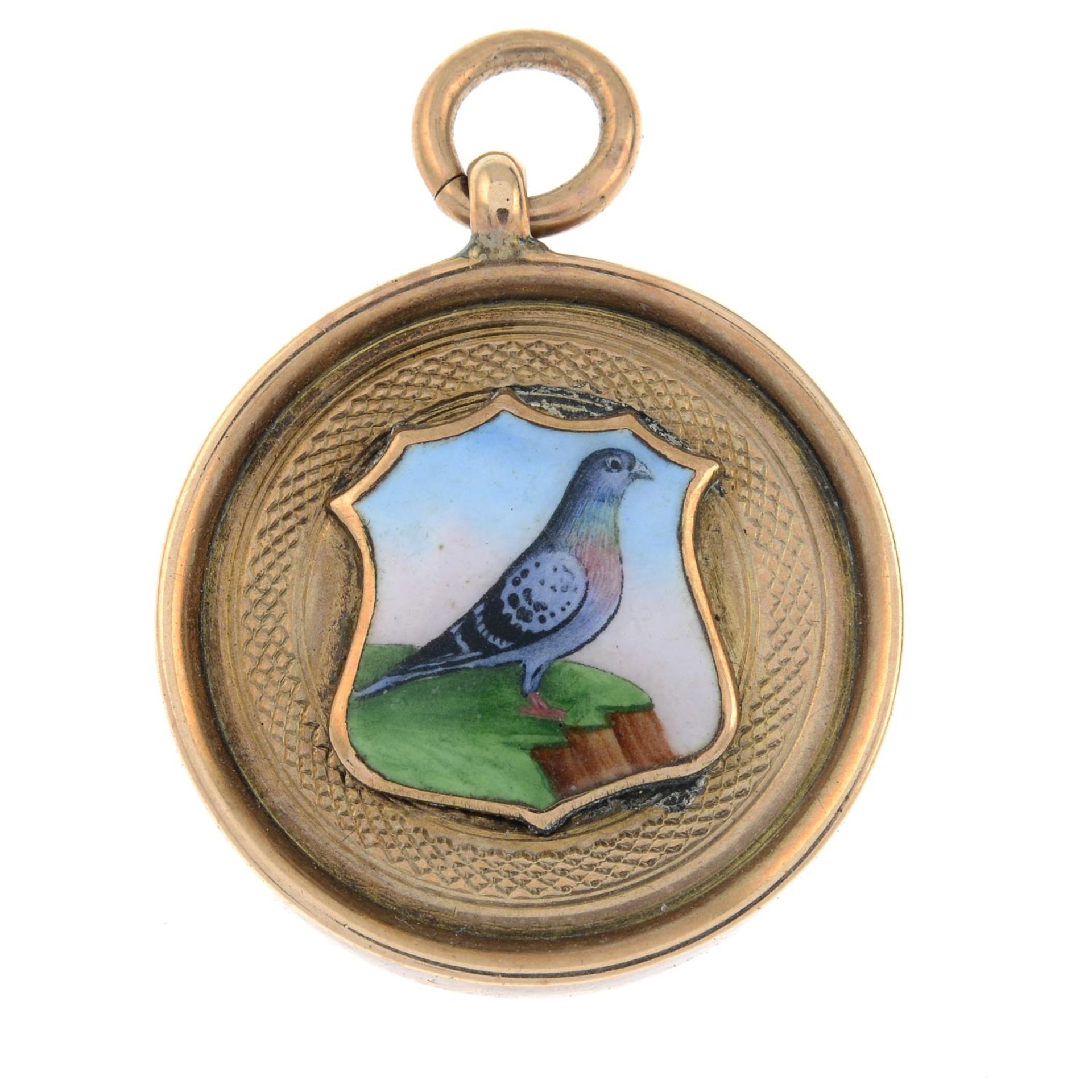 An early 20th century 9ct gold and enamel medallion pendant,