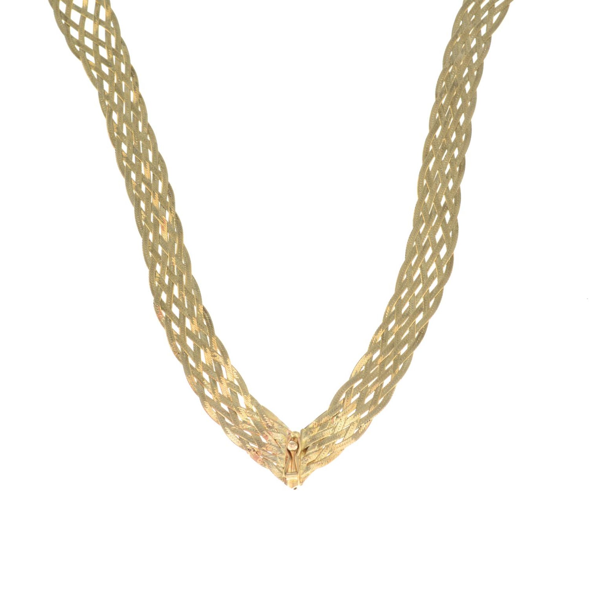 A 1990s 9ct gold woven necklace.Import marks for Birmingham, 1990.