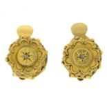 A pair of early 20th century 18ct gold diamond point earrings.Length 1cm.