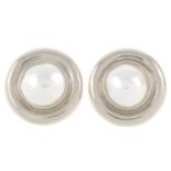 A pair of 18ct gold mabe pearl earrings.Approximate dimensions of one mabe pearl 10mms.Hallmarks